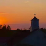 Sunset over the building behind which the new convent will be built